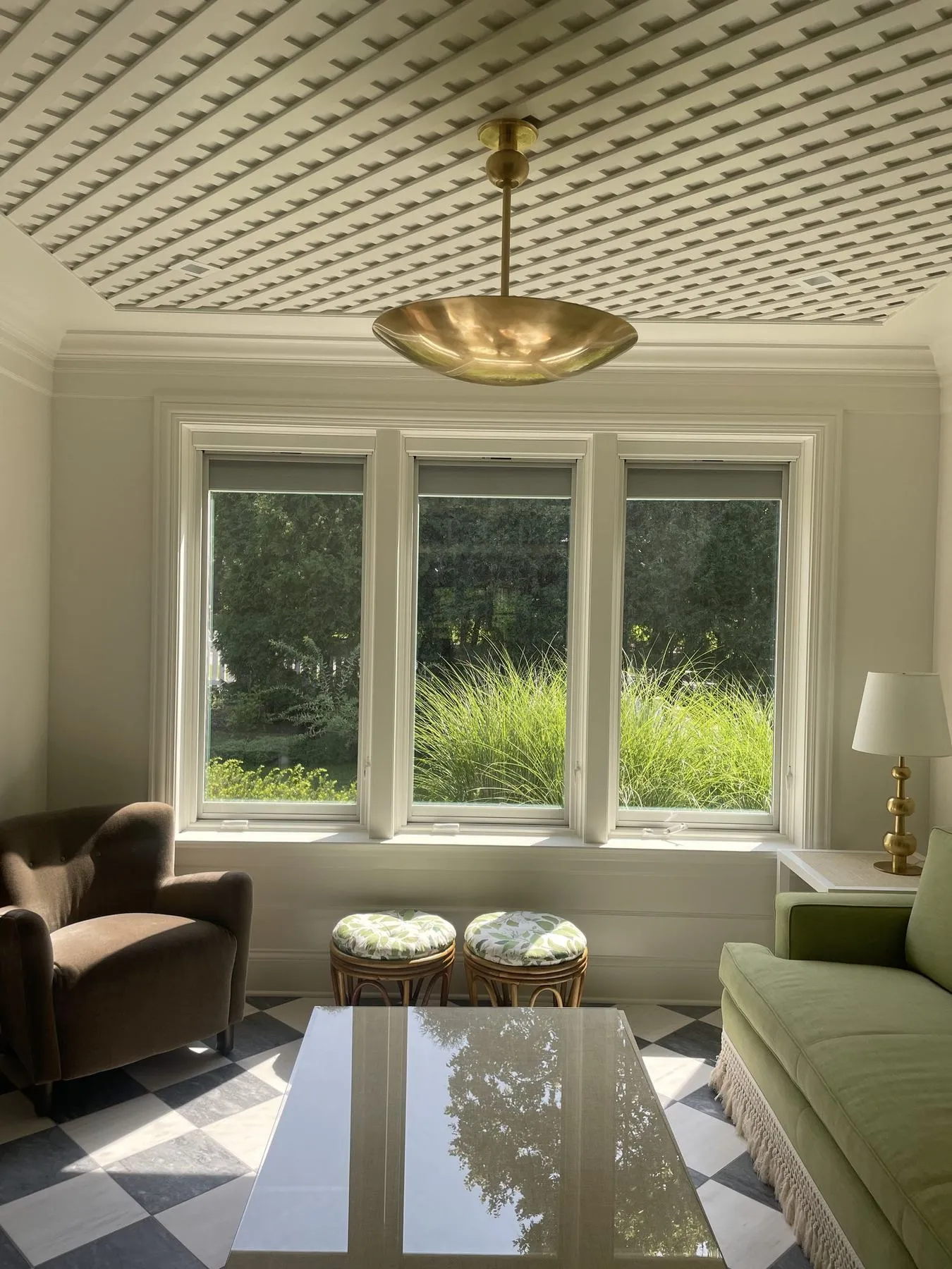 Sunroom with a checkerboard floor