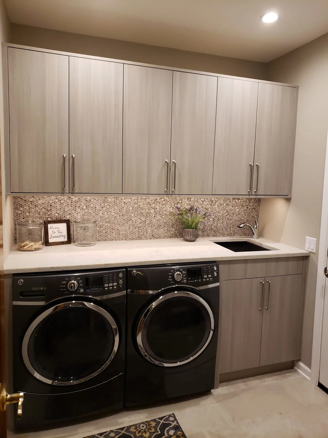 Laundry with side-by-side machines and a sink